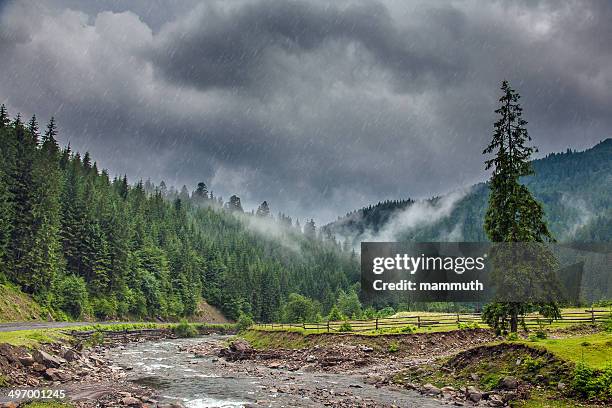 rainstorm in the mountains - romania mountain stock pictures, royalty-free photos & images