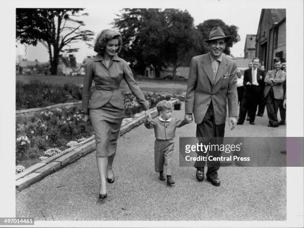 Actors and spouses Lauren Bacall and Humphrey Bogart, with their son Stevie, leaving the studios at Isleworth together, September 7th 1951.