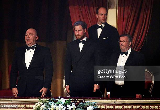 Prince Harry stands for the national anthem at the Royal Albert Hall for the Royal Variety Performance on November 13, 2015 in London, England.