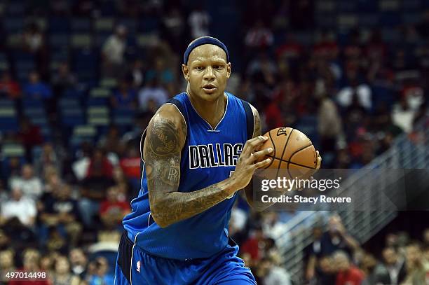 Charlie Villanueva of the Dallas Mavericks handles the ball during a game against the New Orleans Pelicans at the Smoothie King Center on November...