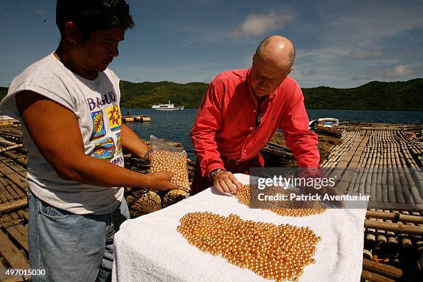 Jacques Branellec has arrived to inspect the new harvest of golden pearls on the Taytay oyster farm, having piloted a helicopter to Palawan, 500km...