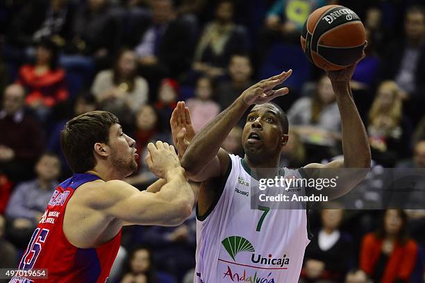 Viacheslav Kravtsov of CSKA Moscow is in action against Richard Hendrix of Unicaja Malaga during the Turkish Airlines Euroleague match between CSKA...