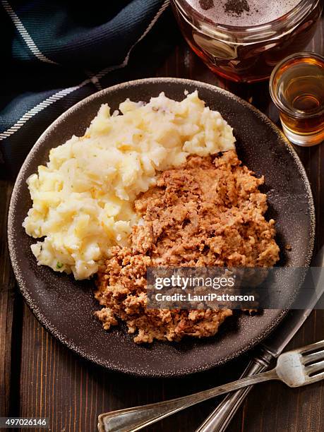 traditional haggis and neeps with whiskey and a beer - roast dinner pub stock pictures, royalty-free photos & images