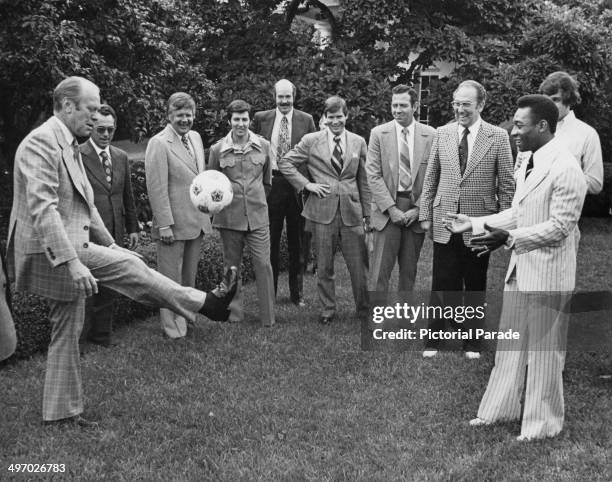 Brazilian footballer Pele with Gerald Ford, 38th President of the United States, in the grounds of the White House, Washington.