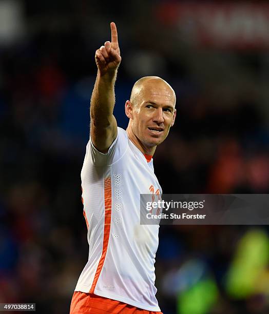 Netherlands scorer Arjen Robben celebrates the third Dutch goal during the friendly International match between Wales and Netherlands at Cardiff City...