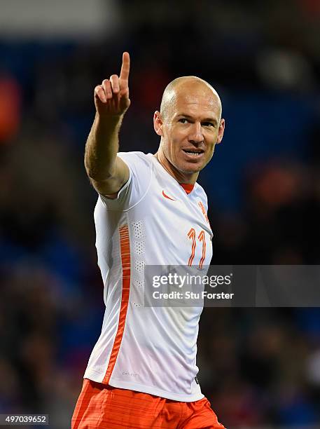 Netherlands scorer Arjen Robben celebrates the third Dutch goal during the friendly International match between Wales and Netherlands at Cardiff City...