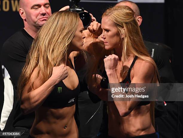 Opponents Ronda Rousey of the United States and Holly Holm of the United States face off during the UFC 193 weigh-in at Etihad Stadium on November...