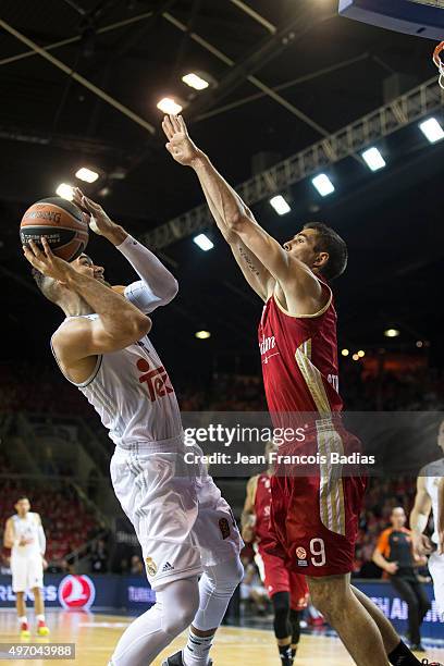 Jeffery Taylor, #44 of Real Madrid competes with Jeremy Leloup, #9 of Strasbourg during Regular Season date 5 game between Strasbourg v Real Madrid...