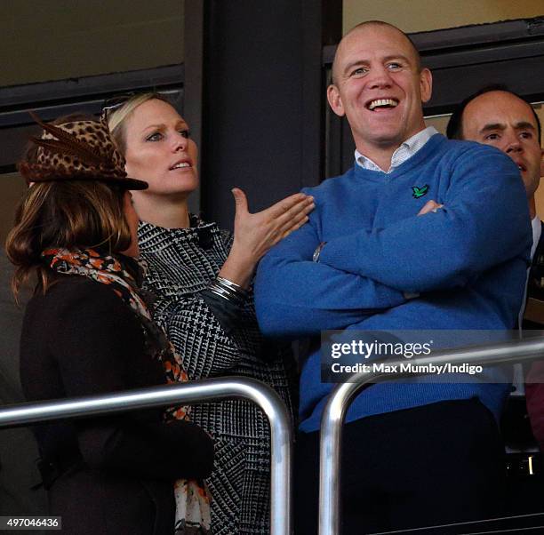 Dolly Maude, Zara Phillips and Mike Tindall watch the racing as they attend Countryside Day of The Open meeting at Cheltenham Racecourse on November...