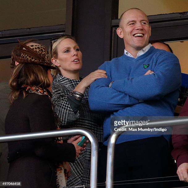 Dolly Maude, Zara Phillips and Mike Tindall watch the racing as they attend Countryside Day of The Open meeting at Cheltenham Racecourse on November...