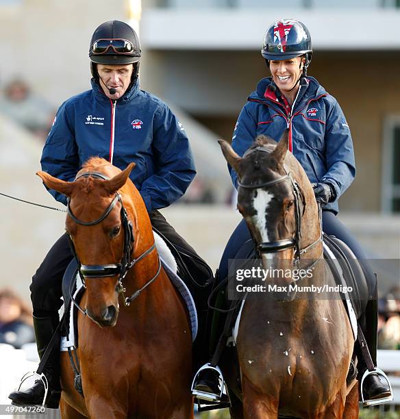 Tony McCoy receives a dressage lesson from Charlotte Dujardin as they attend Countryside Day of The Open meeting at Cheltenham Racecourse on November...