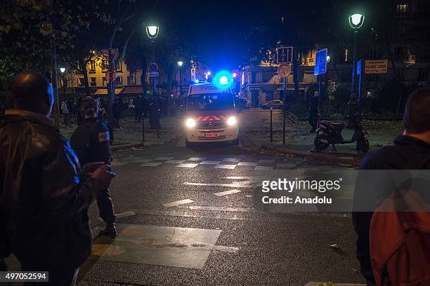 French police officers take security measures around the Bataclan concert hall in Paris, France on November 13 after deadly shootings and explosions...