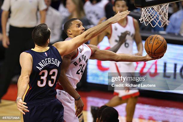 Toronto, Canada - November, 13 2015 - In second half action, Toronto Raptors guard Norman Powell goes for the hoop around New Orleans Pelicans...