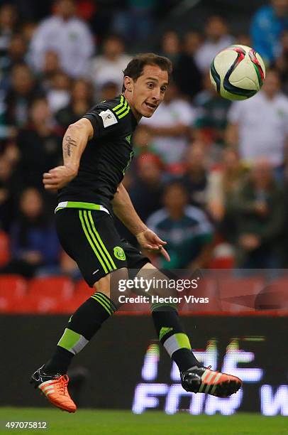 Andres Guardado of Mexico passes the ball during the match between Mexico and El Salvador as part of the 2018 FIFA World Cup Qualifiers at Azteca...