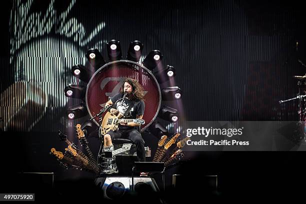 Dave Grohl of the american rock band Foo Fighters pictured on stage as he performs live at Unipol Arena Bologna. Foo Fighters is an American rock...
