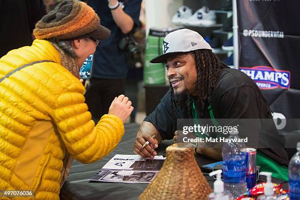 Seattle Seahawks Running Back Marshawn Lynch attends an in-store appearance for the launch of BEASTMODE x PSD at Champs at Bellevue Square on...