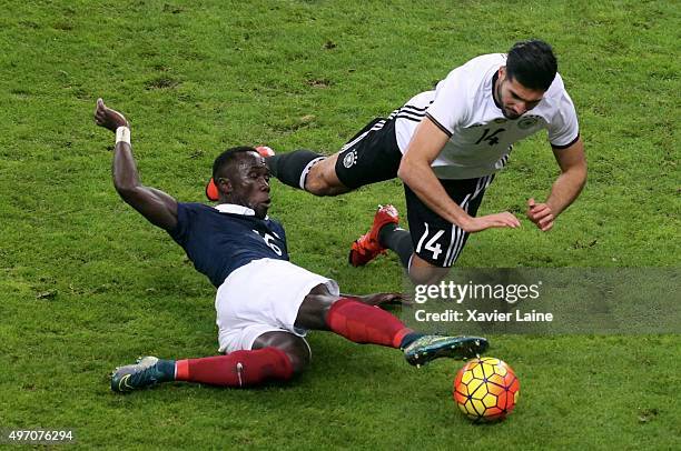 Bacary Sagna of France and Emre Can of Germany in action during the International Friendly games between France and Germany at Stade de France on...