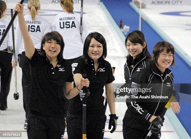 Japan members celebrate their win against the United States during World Women's Curling Championship at Aomori Prefecture Skate Center on March 22,...