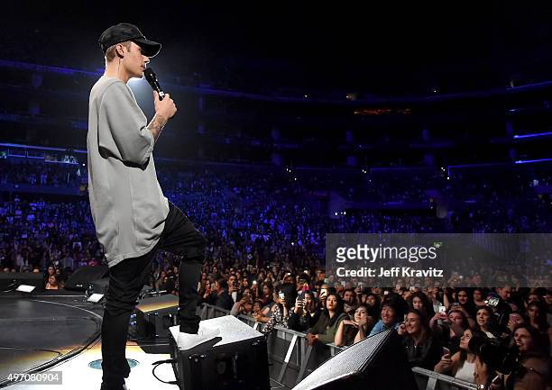 Singer/songwriter Justin Bieber performs onstage during an evening with Justin Bieber to celebrate the release of his new album "Purpose" at Staples...