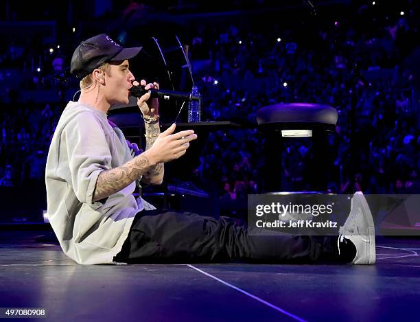 Singer/songwriter Justin Bieber performs onstage during an evening with Justin Bieber to celebrate the release of his new album "Purpose" at Staples...