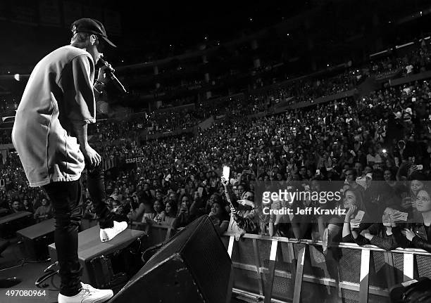 Singer/songwriter Justin Bieber performs onstage during an evening with Justin Bieber to celebrate the release of his new album "Purpose" at Staples...