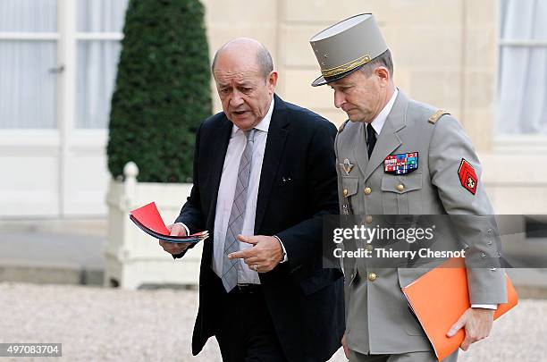 Jean -Yves Le Drian, French Minister of Defence and Chief of the Defence Staff General Pierre de Villiers arrive at the Elysee Palace in Paris for a...