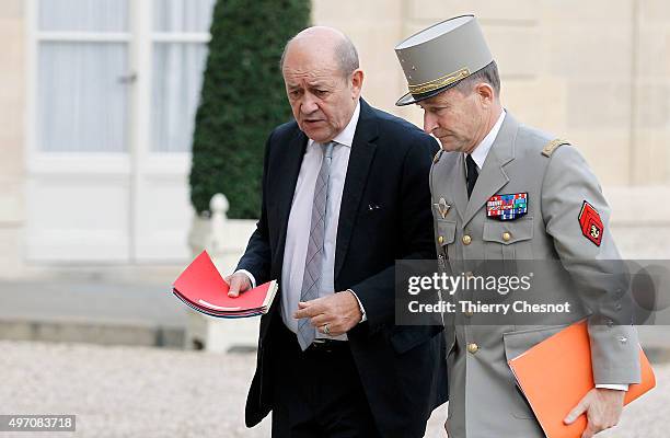 Jean -Yves Le Drian, French Minister of Defence and Chief of the Defence Staff General Pierre de Villiers arrive at the Elysee Palace in Paris for a...