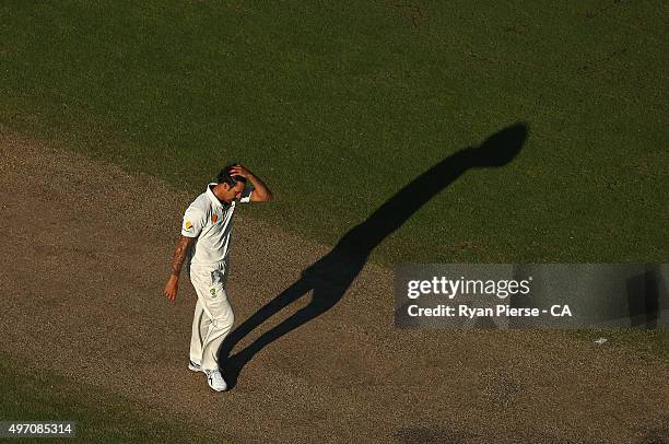 Mitchell Johnson of Australia reacts while bowling during day two of the second Test match between Australia and New Zealand at WACA on November 14,...