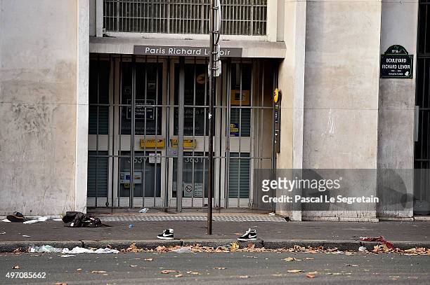 Shoes are left nearby the Bataclan theater after a terrorist attack on November 14, 2015 in Paris, France. At least 120 people have been killed and...