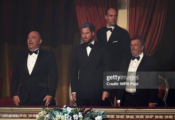Britain's Prince Harry stands for the national anthem at the the Royal Variety Performance at the Albert Hall on November 13, 2015 in London, England.