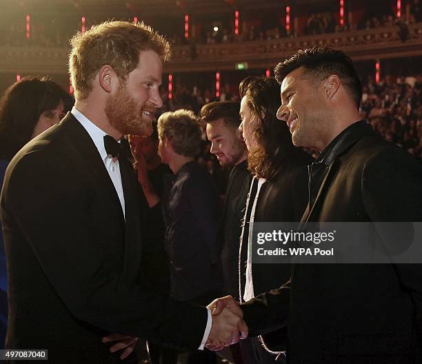 Britain's Prince Harry greets Ricky Martin after the Royal Variety Performance at the Albert Hall on November 13, 2015 in London, England.