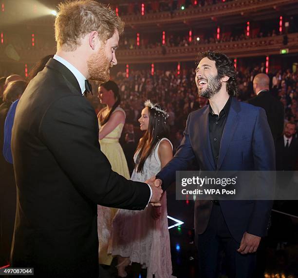 Britain's Prince Harry greets singer Josh Groban after the Royal Variety Performance at the Albert Hall on November 13, 2015 in London, England.