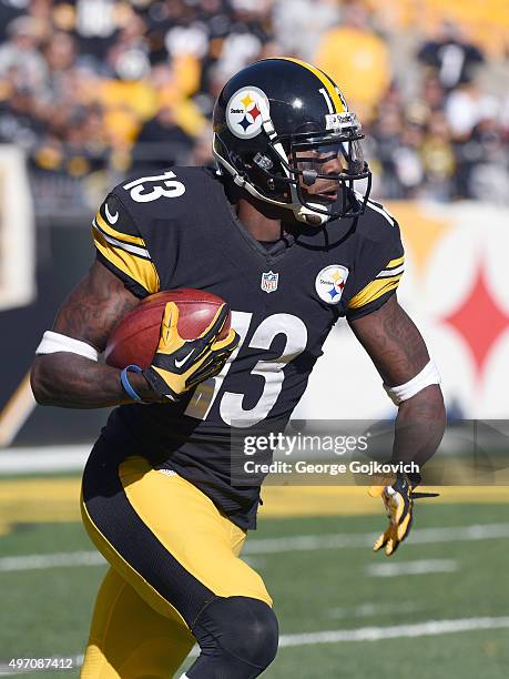 Kick returner Jacoby Jones of the Pittsburgh Steelers runs with the football during a game against the Oakland Raiders at Heinz Field on November 8,...