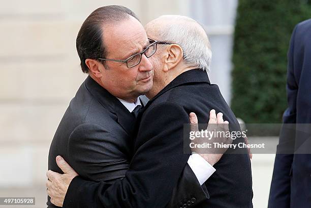 French President Francois Hollande welcomes Tunisian President Beji Caid El Sebsi on November 14, 2015 in Paris, France. This meeting follows a...