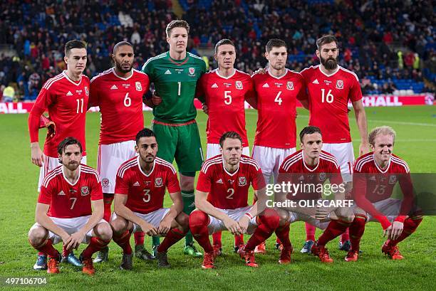 The Wales team, Wales's striker Tom Lawrence, Wales's defender Ashley Williams, Wales's goalkeeper Wayne Hennessey, Wales's defender James Chester,...
