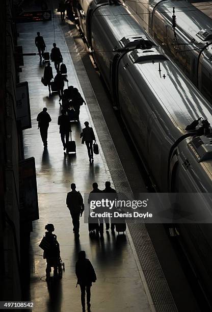 Commuters board a train at Atocha station a day after the Paris attacks on November 14, 2015 in Madrid, Spain. According to reports, over 120 people...