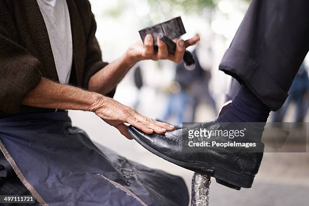 you can see your face in them - shoe polish stock pictures, royalty-free photos & images