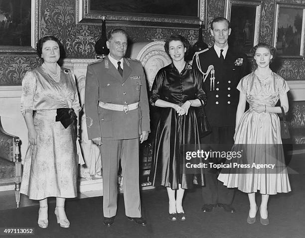 Marshal Tito , the 1st President of Yugoslavia, poses with the British royal family after a lunch at Buckingham Palace in London, 17th March 1953....