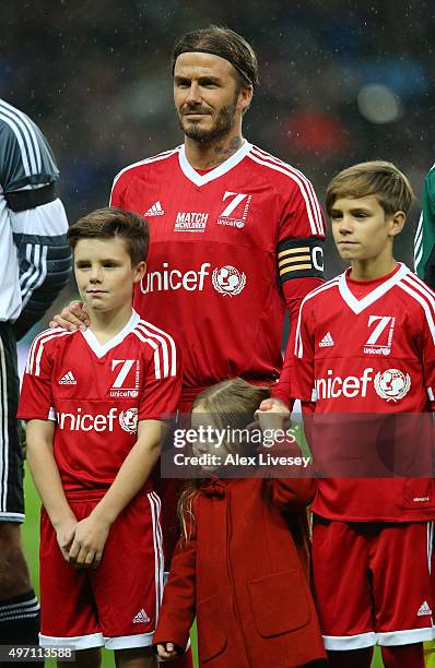 David Beckham the Captain of Great Britain & Ireland, his children Cruz Beckham, Harper Beckham and Romeo Beckham pose for the cameras prior to...