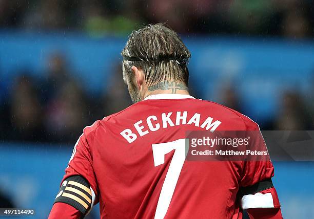 David Beckham of Great Britain and Ireland in action during the David Beckham Match for Children in aid of UNICEF between Great Britain and Ireland...