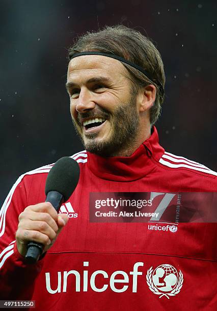 David Beckham of Great Britain and Ireland addresses the fans during the David Beckham Match for Children in aid of UNICEF between Great Britain &...