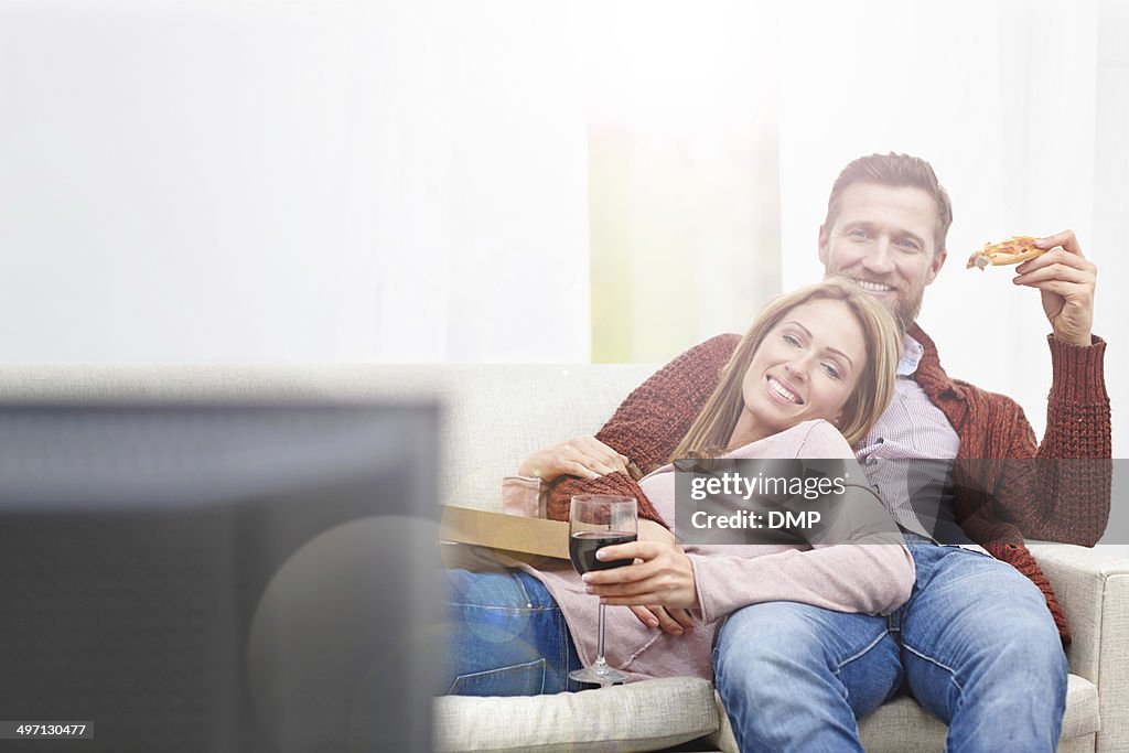 Young couple spending free time together at home