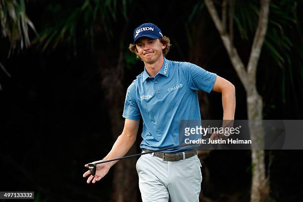 Will Wilcox of the United States reacts after putting on the first hole during the third round of the OHL Classic at the Mayakoba El Camaleon Golf...