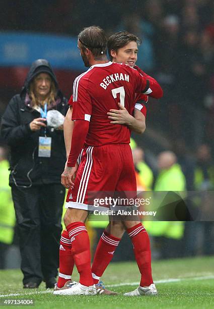 Brooklyn Beckham of Great Britain and Ireland comes on as a substitute for his father, David Beckham during the David Beckham Match for Children in...