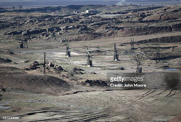Oil rigs sits on a hillside on November 14, 2015 near Derek, in Rojava, Syria. Rojava is pumping the oil and then crudely refining into diesel fuel...