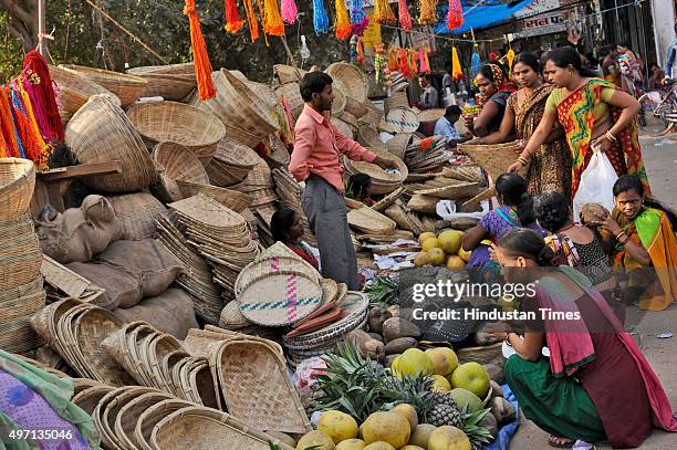 Hindu devotees are out for shopping ahead of the upcoming Chhath Puja festival at a market, on November 14, 2015 in Noida, India. The Chhath...