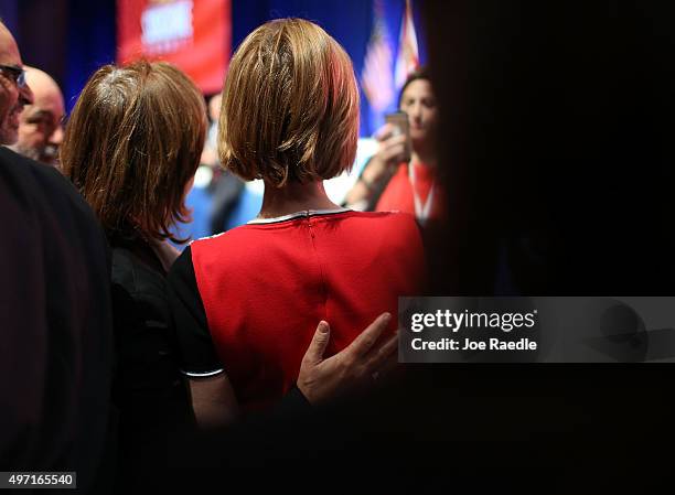 Republican presidential candidate Carly Fiorina greets people during the Sunshine Summit conference being held at the Rosen Shingle Creek on November...