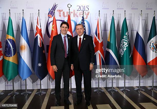 Turkish President Recep Tayyip Erdogan greets Canadian Prime Minister Justin Trudeau as he arrives for a dinner hosted by President Erdogan in honor...