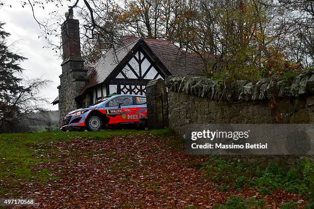 Hayden Paddon of New Zealand and John Kennard of New Zealand compete in their Hyundai Motorsport Hyundai i20 WRC during Day Two of the WRC Wales...