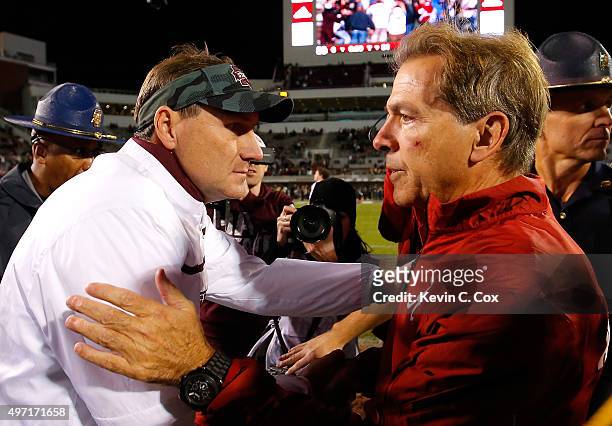 Head coach Nick Saban of the Alabama Crimson Tide shakes hands with head coach Dan Mullen of the Mississippi State Bulldogs after their 31-6 win at...